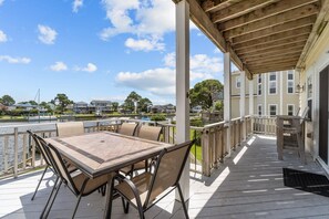 Enjoy al fresco dining out on the Deck with unforgettable views of the water.