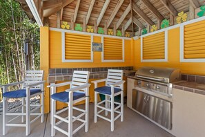 The Tiki Bar is perfect for enjoy some drinks and whipping some fresh, local seafood on the grill.