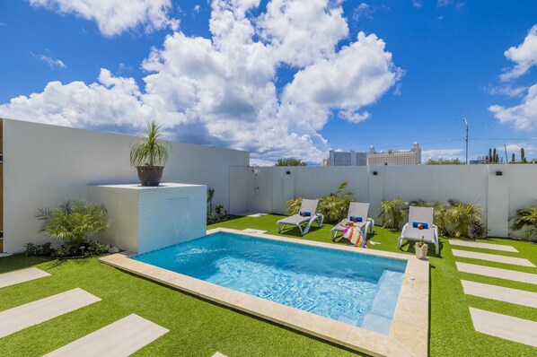 Relax and soak up the sun in your private pool area—perfect for a refreshing swim or lounging in style.