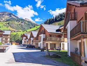 Cloud, Sky, Building, Daytime, Plant, Mountain, Window, Azure, House, Car