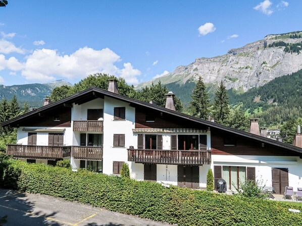 Sky, Cloud, Plant, Building, Property, Window, Mountain, House, Tree, Land Lot