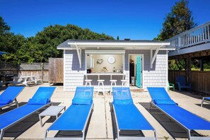 Pool Bar with Lounge chairs for sunbathing