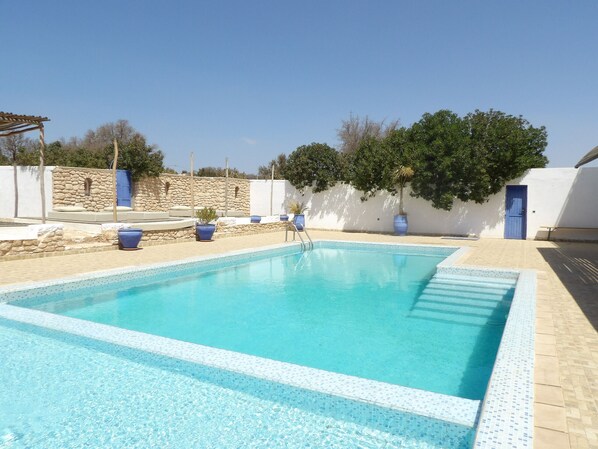 12 m x 4 m swimming pool with a 40 cm deep paddling pool