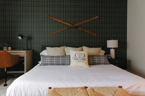 Bedroom 1 has a king bed and WFH station for you to both relax and be productive while away.