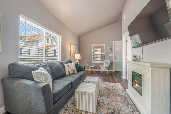 Living room with fireplace and wifi TV