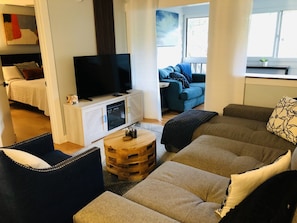 TV stand has an electric fireplace that has the ability to throw heat or not.