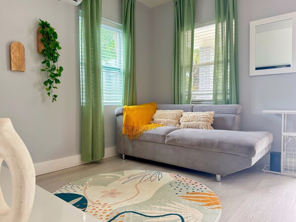 Sofa perfect for 2, adjustable headrest, side table w/ USB and outlets. 

