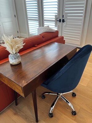 Work space with desk and chair.