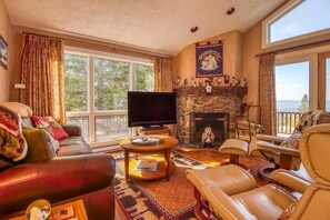 Cozy living room with fireplace and TV