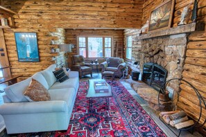 Stay toasty with a real wood fireplace (firewood included).