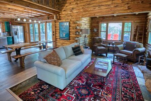 A nice large sofa awaits you in the sunken living space. 