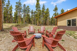 Private 2+ acre lot with aspen + evergreen trees
Propane fire pit, string lights