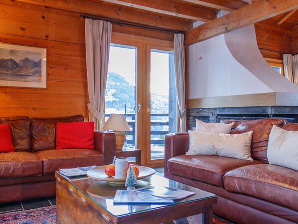 Furniture, Chair, Room, Hardwood, Living Room, Mountain Range, Couch, Wood Stain, Wood Flooring