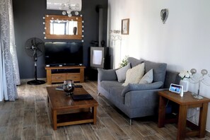 International channels and Netflix on the large TV in this stylish living space