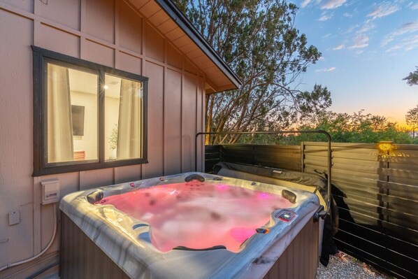 Unwind and relax in this private hot tub.