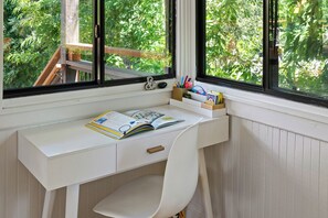 Work, homework, or simply a desk with a view in the living room.