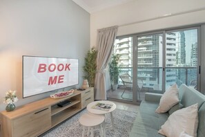 Sitting room with balcony leading off 