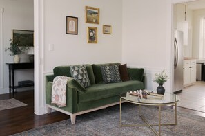 1ST FLOOR LIVING ROOM
- Couch, lounge chairs
- 55" LG Smart TV