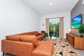 Relax in the spacious living area, perfect for family gatherings.