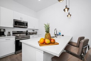 Whip up culinary delights in this fully stocked kitchen!