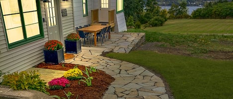 Enjoy sprawling lake views and spectacular sunsets at our charming farmhouse.