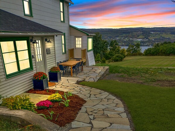 Enjoy sprawling lake views and spectacular sunsets at our charming farmhouse.