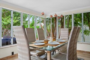 Gather around the spacious 6-seater dining table, perfect for enjoying meals and creating memories with family or friends in a comfortable and inviting setting