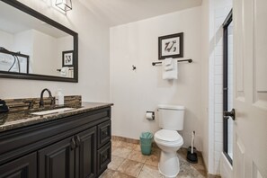 This is a full bathroom with a shower and a tub.