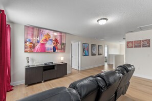 Second Floor | Theater Room | 85" TV | Comfy Reclining Stadium Seating