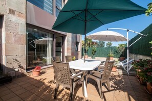 Property building,Living room,Floor plan,Pool view,Swimming pool