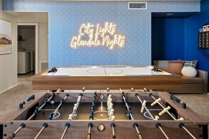 Step into fun in our game room, complete with foosball and shuffleboard—perfect for some friendly competition!