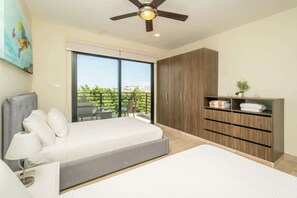 This bedroom has direct access to the balcony