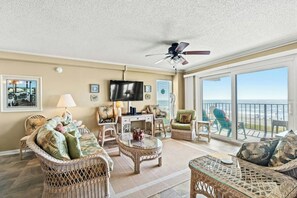 This comfy living room offers space for everyone to gather!