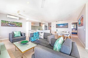 Kick back in the evenings in the spacious living room. There is ample sofa seating and armchairs to fit the whole family. The central TV caters to all your entertainment needs.