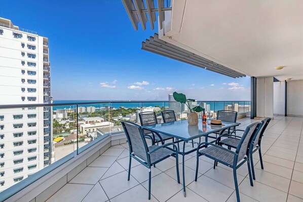 Dine alfresco on your spacious private balcony. There is a large outdoor dining table perfect for entertaining with a view.