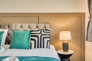 Bedroom 1 with comfortable zip link beds which is configured as two single beds by default or can be zipped together to form a king size bed upon request