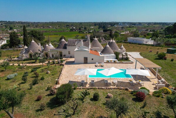 Activities, Balcony / Terrace / Patio, Building Exterior, Garden, Main Entrance, Pool, Spring, Wellness