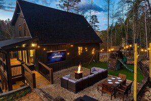 Relax in the cozy seating by the fire pit area & toast some marshmallows!