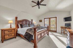 Bedroom 1: Master bedroom, king bed, 32” Smart TV w/cable, closet, French doors to a small patio, en-suite bath, upper floor
