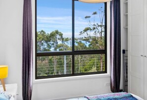 Bedroom one, views out to Pirates Bay