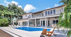 Sunny Pool Area Adorned with Stylish Sun Loungers