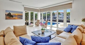 First-Floor Lounge: Comfortable Sofa and Huge TV