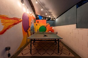 Kettler Ping Pong table with a custom painted mural backdrop and lighting for a game whether day or night!