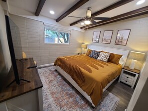 Our bedroom features a roomy king-sized bed, with a Nectar Premier Copper hybrid mattress for your comfort. 