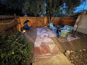 Fully fenced backyard patio area with plenty of seating to enjoy the Arizona weather. 