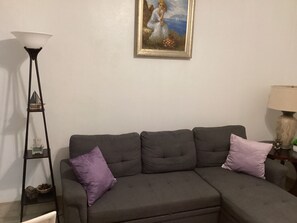 The living room sectional sleeper seats up to 4 guests.