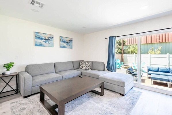 Relax and unwind in the comfort of this inviting and spacious living area, designed for cozy stay.
