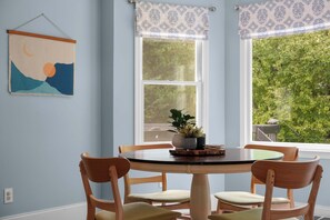 Sip morning coffee or enjoy a meal together at the dining table