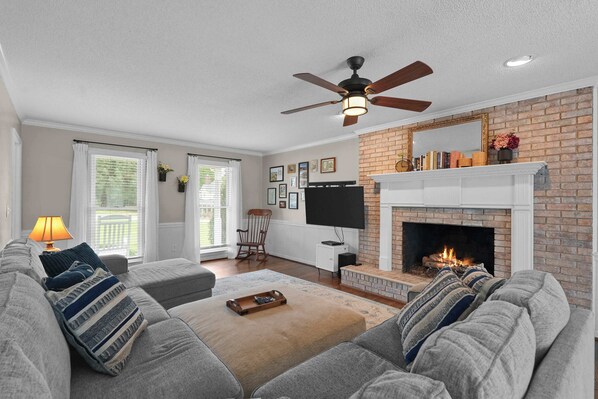 Curl up in the cozy living room & stream your favorites on the smart TV