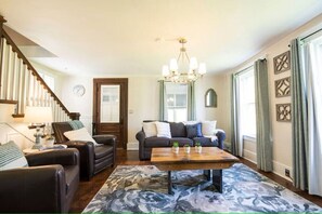 Livingroom with view of Entry door
